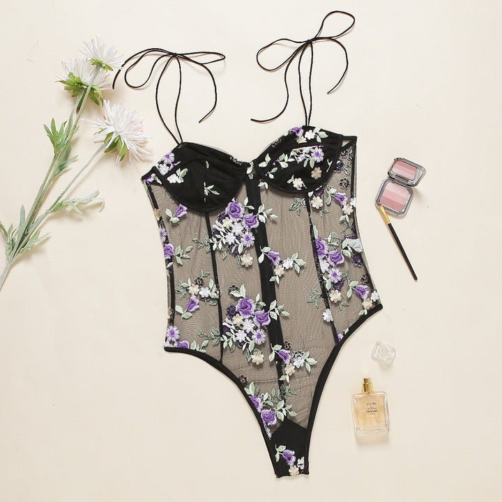Bodysuit with purple embroidery